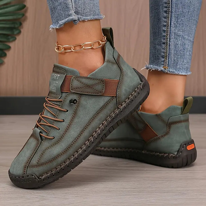 Close-up of women's wide fit orthopaedic trainers, featuring breathable fabric for daily wear.