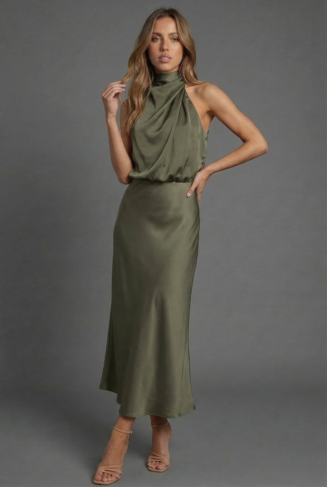 Chic women's midi dress, halter neck design, perfect for summer formal wear.