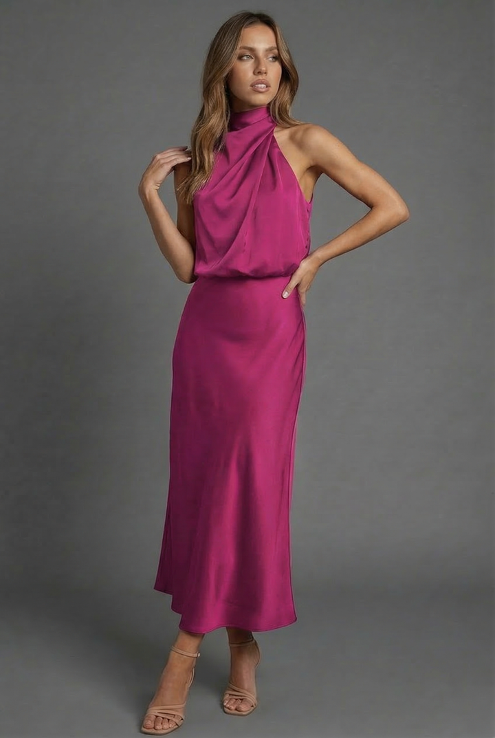 Flowy summer wedding guest dress, midi length with a fashionable halter neck.
