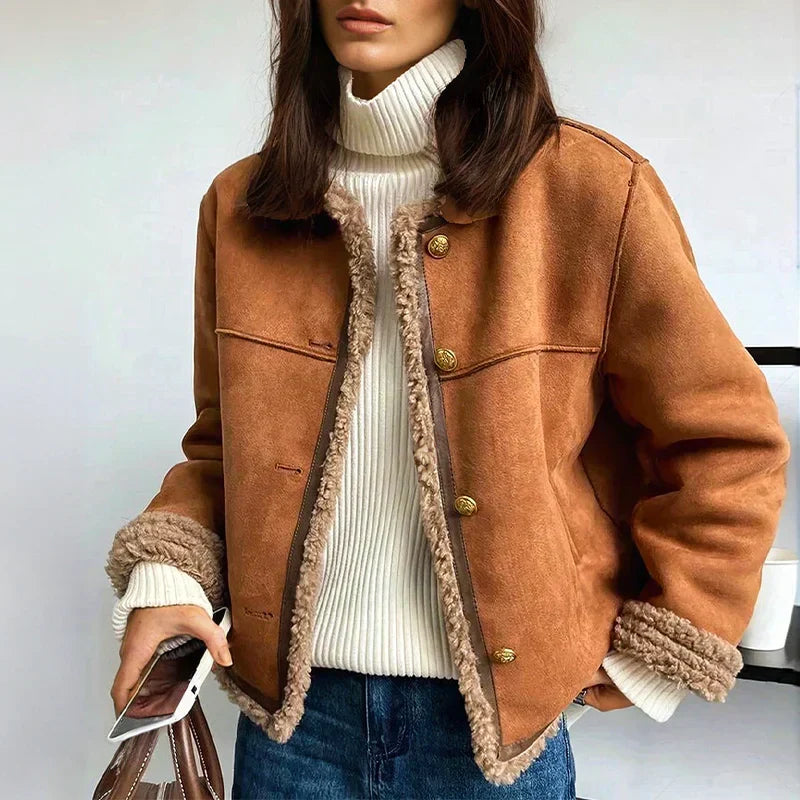 Elegant Lila women's faux shearling jacket. Chic winter outerwear, cozy & warm for stylish cold-weather looks.