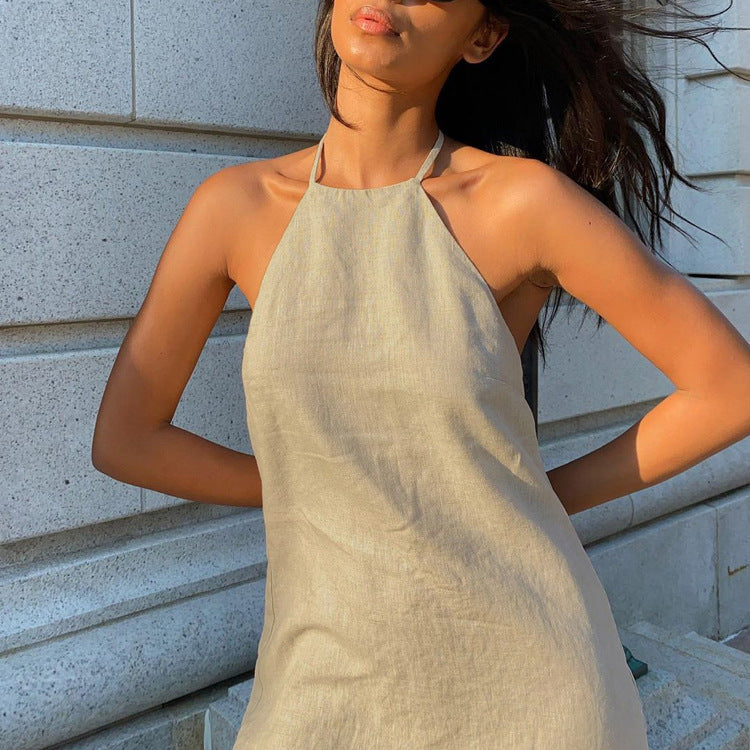 Stylish women's halter neck A-line mini dress. This sleeveless design offers chic elegance for any occasion.