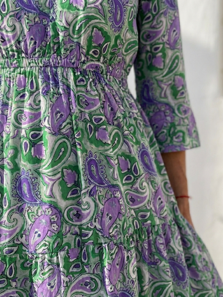 Stylish women's bohemian maxi dress with long sleeves, V-neck, and a beautiful paisley print, perfect for summer.