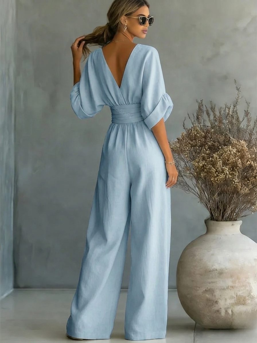 Tailored fit V-neck women's jumpsuit, a perfect one-piece outfit for work or evening events.