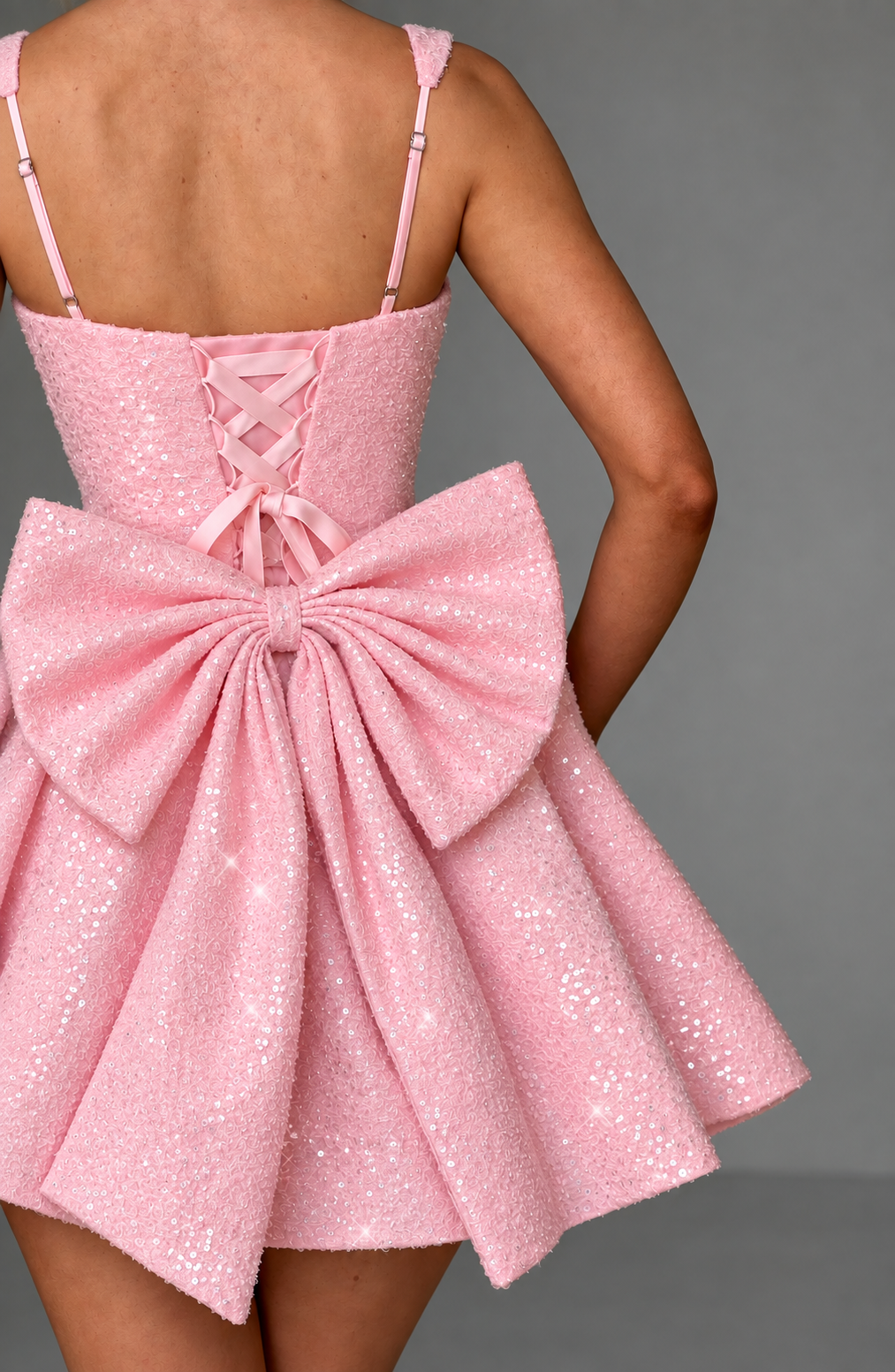 Square neck mini party dress with a cute bow and flared silhouette, great for evening events.
