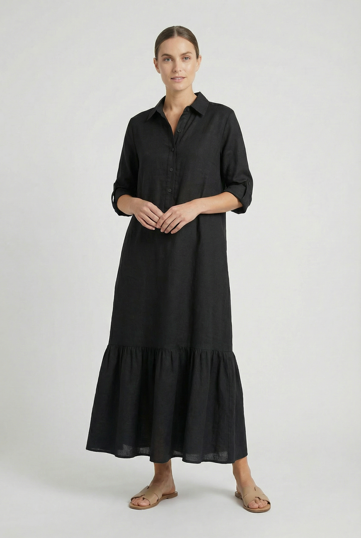 Women's button-front shirt dress, elegant maxi length with tiered skirt and long sleeves. Casual chic fashion.