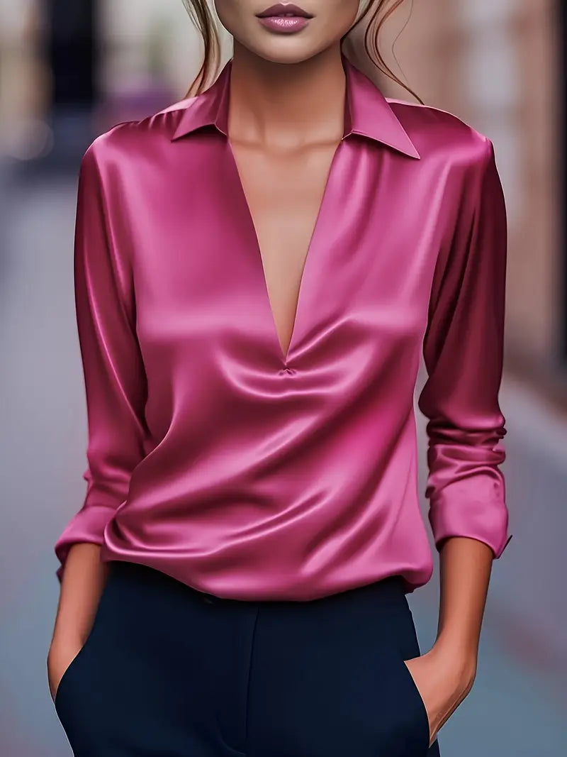 Stylish women's long sleeve V-neck shirt. Versatile collared blouse for work, office, or casual wear.