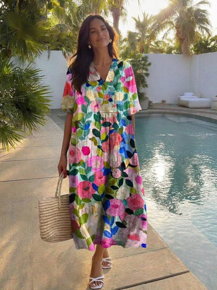 Comfortable women's floral midi sundress with short sleeves, perfect for breezy vacation wear.