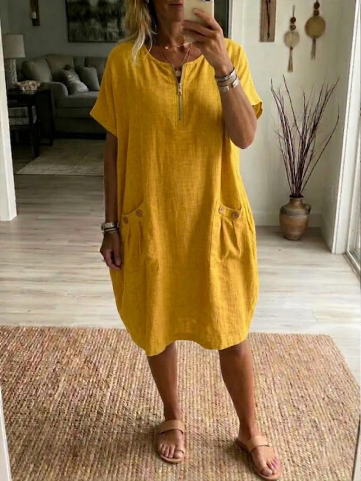 Khaki women's effortless zip-front casual summer dress, knee-length with pockets for comfort.