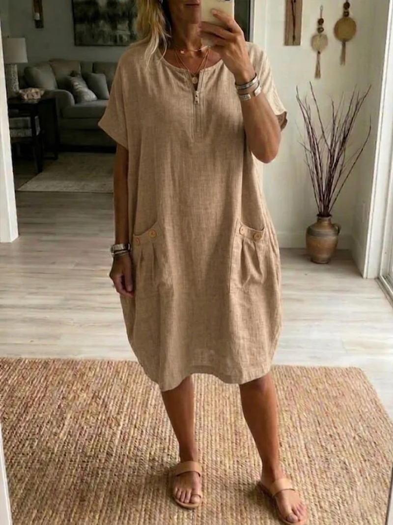 Red women's comfortable zip-front V-neck summer dress, knee-length, ideal for casual everyday wear.