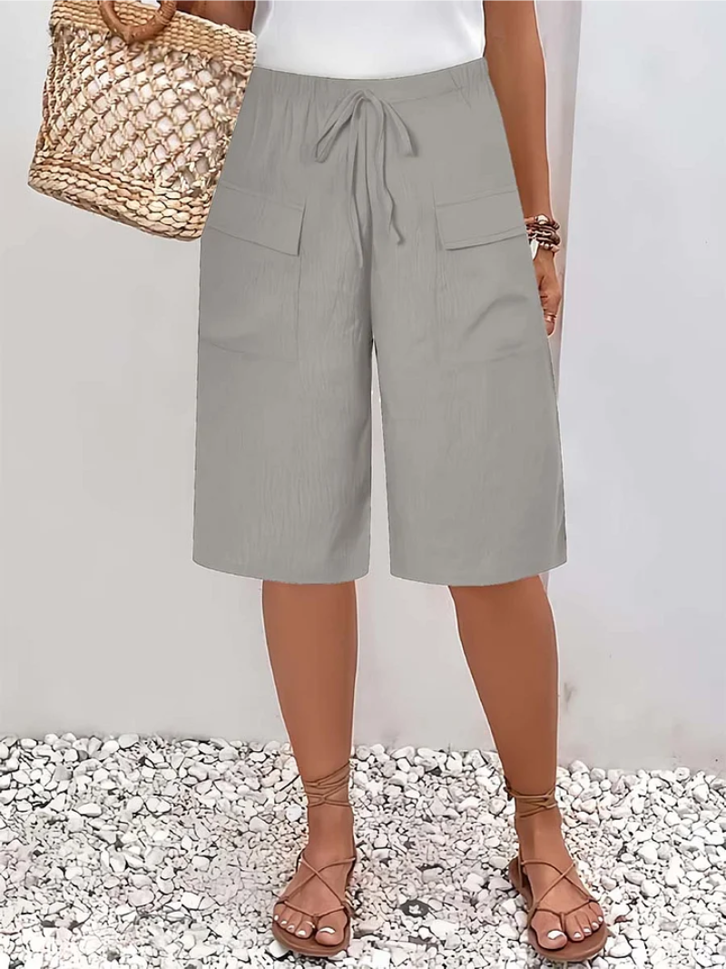 Elegant women's oversize lace pants for sophisticated casual wear. Features a relaxed fit and delicate lace detail.