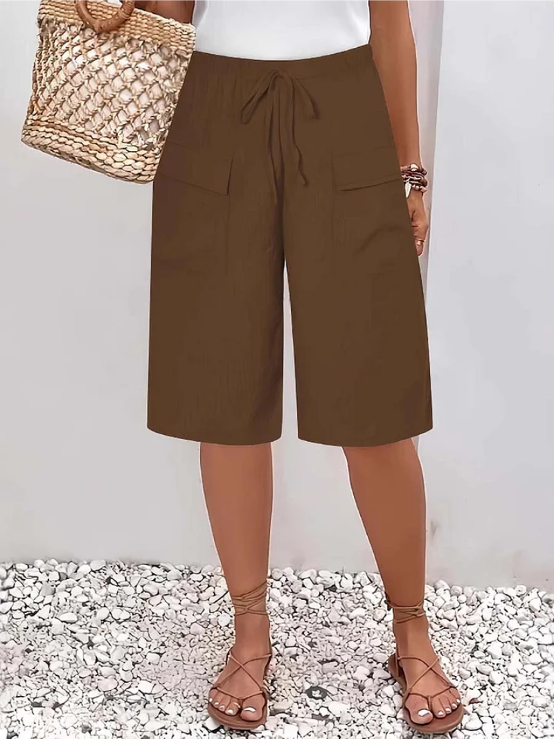 Fashionable women's elegant oversize lace pants, versatile for casual or dressy occasions. Relaxed fit trousers.