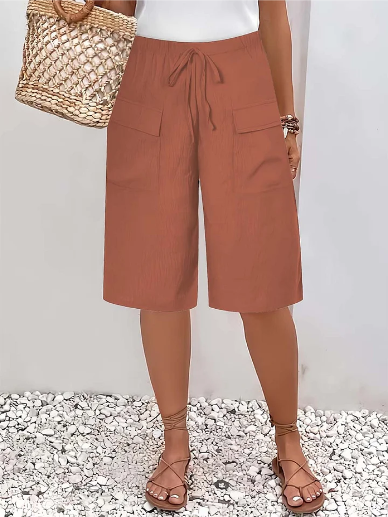 Women's relaxed fit oversize lace pants, offering a blend of casual comfort and elegant style. Perfect daily wear.