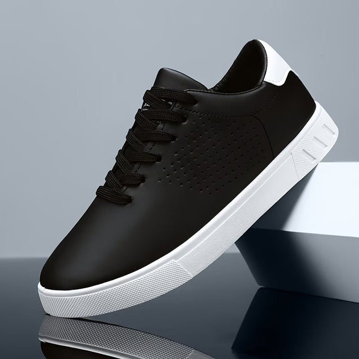 Comfortable low-top men's sneakers in clean white, perfect for versatile everyday casual fashion.