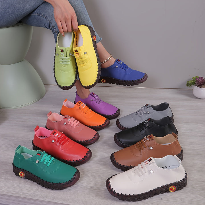 Slip-on casual women's shoes with a round toe, perfect for stylish comfort all seasons.