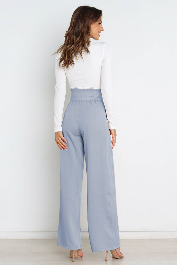 Women's high waist paperbag pants featuring a sophisticated bow detail, great for work.