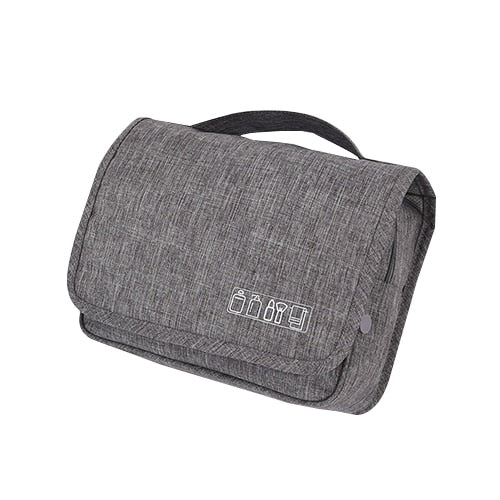 Close-up of waterproof fabric on deluxe hanging toiletry bag, durable for travel & cosmetics.