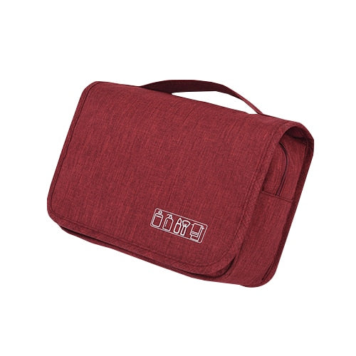 Deluxe hanging toiletry bag in a bathroom, perfect travel organizer for cosmetics & toiletries.