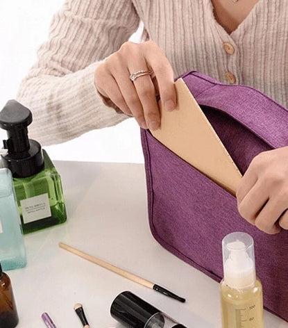 Easy-access hanging toiletry bag, a deluxe travel organizer for unisex personal care & cosmetics.