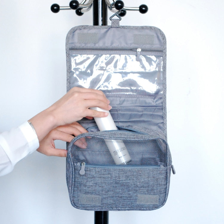 Efficient luggage organizer: Deluxe hanging toiletry bag for neat travel & cosmetic storage.
