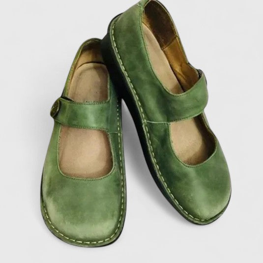 Classic women's Mary Jane shoes with comfortable strap & rounded toe, featuring a distinct stitch-defined sole.