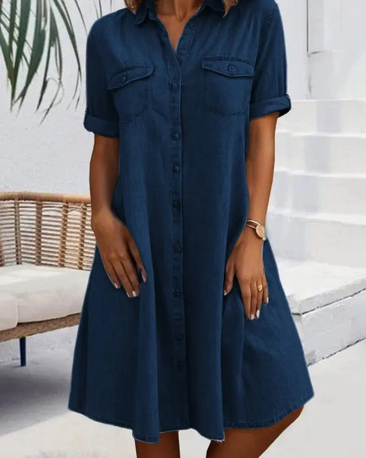 Casual women's denim shirt dress, perfect for everyday wear. Button-down, short sleeve, comfortable & chic.
