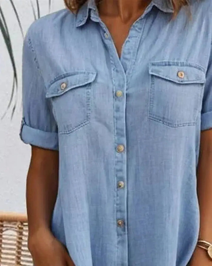 Stylish women's denim shirt dress. A comfortable, short-sleeve, button-down dress for casual, versatile fashion.