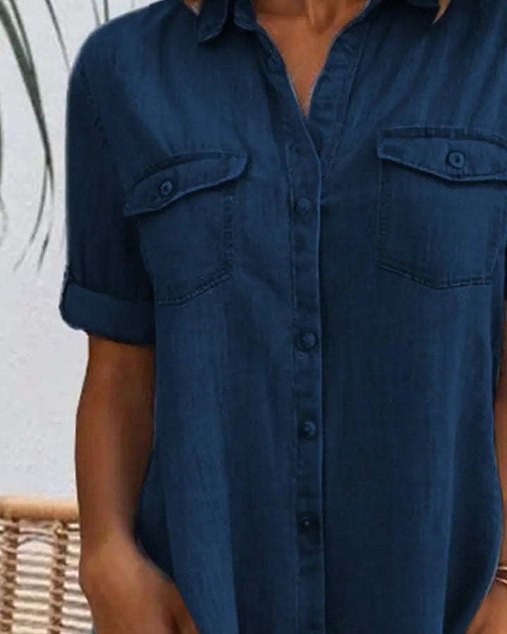 Denim shirt dress for women. Short-sleeve, button-down style, offering effortless casual wear and comfort.