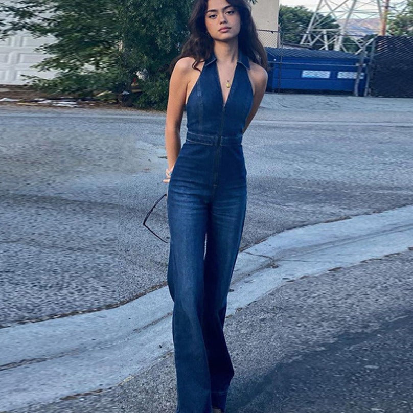 Versatile women's blue halter neck jumpsuit with a flattering silhouette, ideal for chic casual or elegant evening wear.