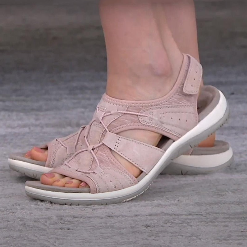 Orthopedic walking sandals for women with adjustable straps, arch support & posture support.