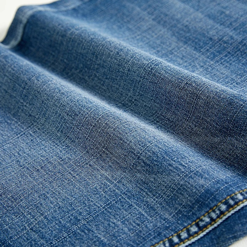 Men's classic gray denim shorts, comfortable & stylish for casual summer occasions.