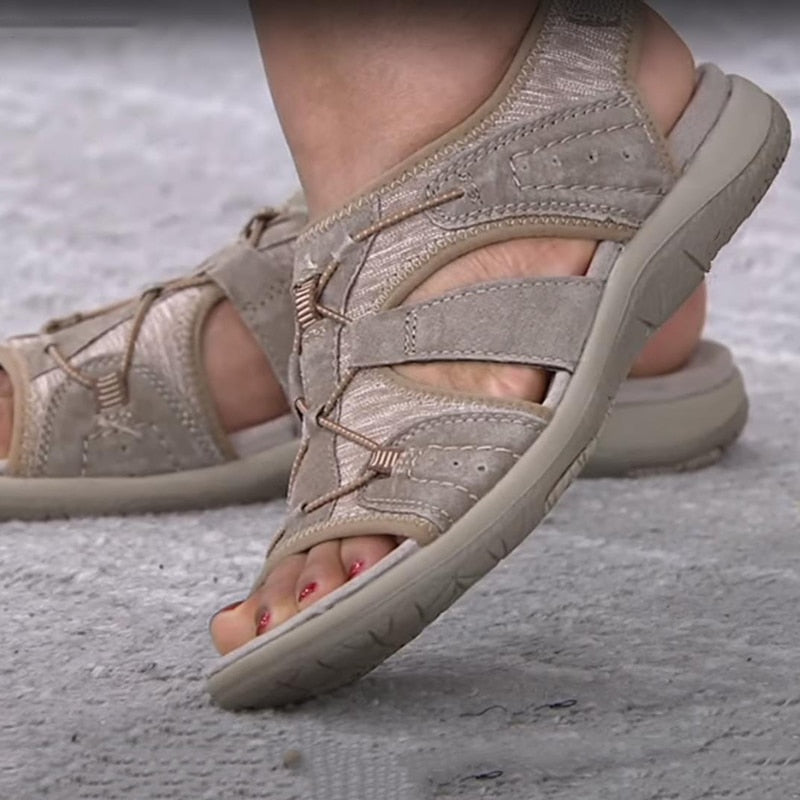 Women's casual sandals, offering elegant comfort and support for summer days.
