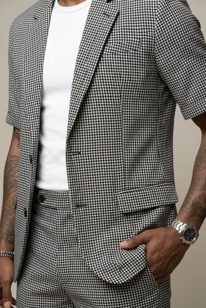 Coordinated men's check short sleeve blazer and matching shorts set, ideal for a stylish summer outfit.