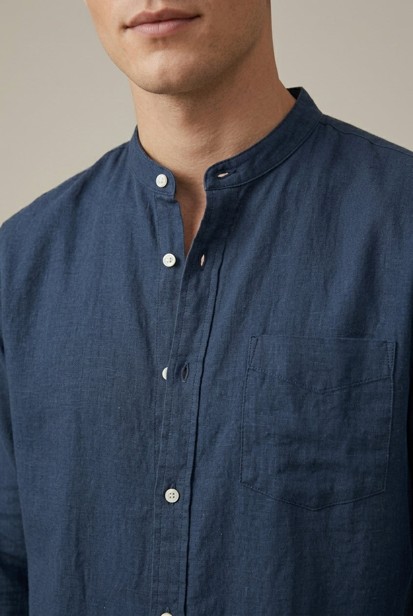 Versatile men's band collar long sleeve shirt with a chest pocket, ideal for smart casual fashion.