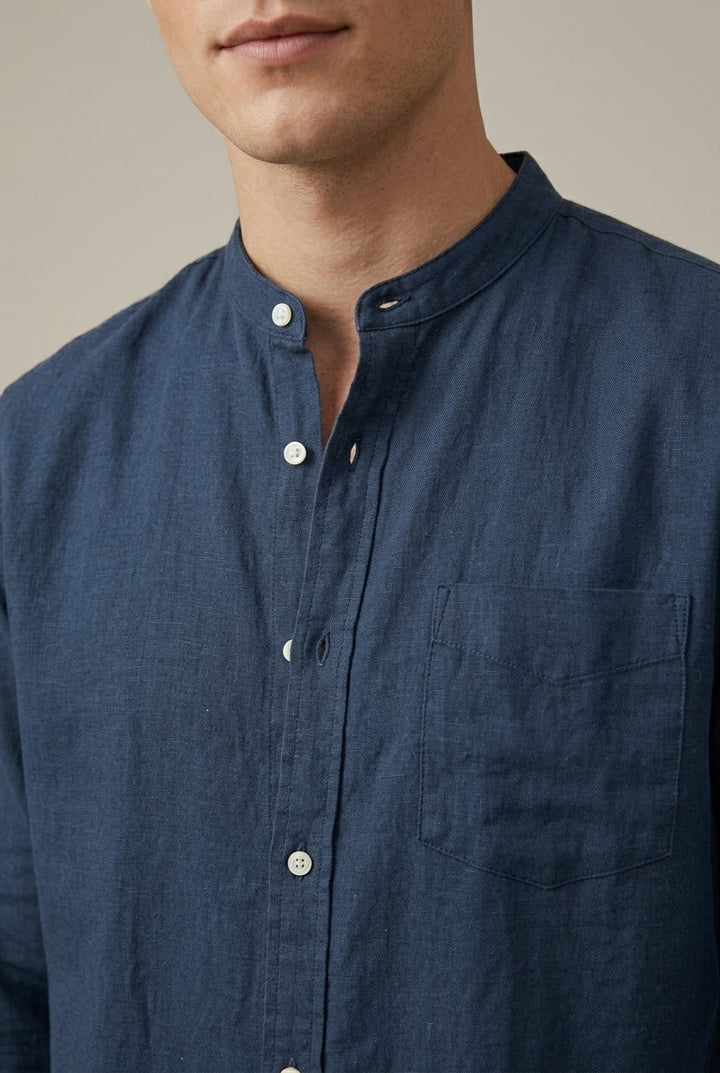 Versatile men's band collar long sleeve shirt with a chest pocket, ideal for smart casual fashion.
