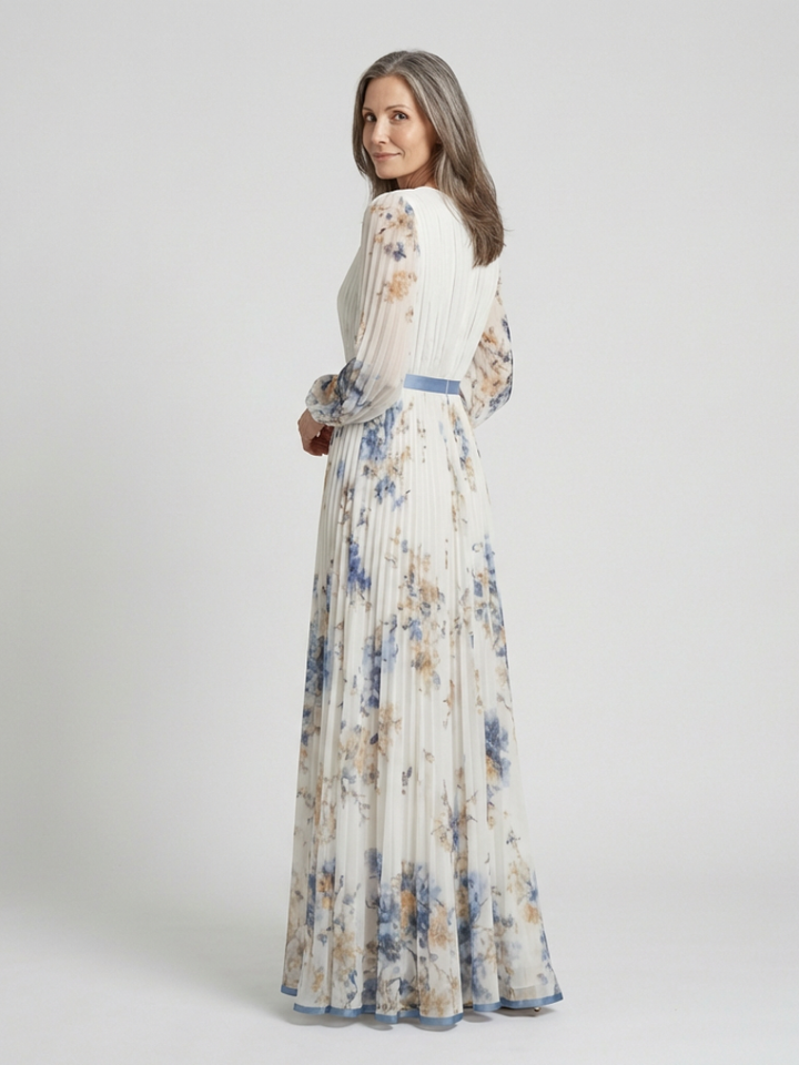 Flowy women's long sleeve V-neck floral print maxi dress, ideal for elegant day or evening wear.