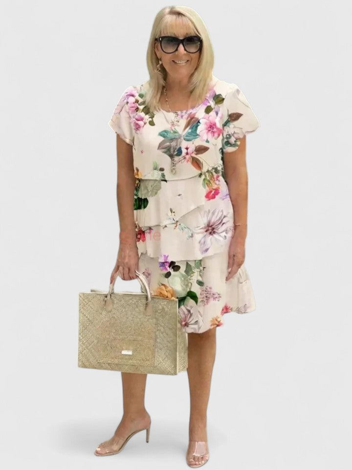 Casual yet elegant women's floral tiered midi dress, ideal for summer parties and comfortable fashion.
