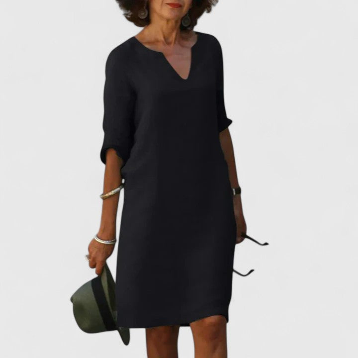 Comfortable women's V-neck midi dress for effortless casual style, perfect for summer.