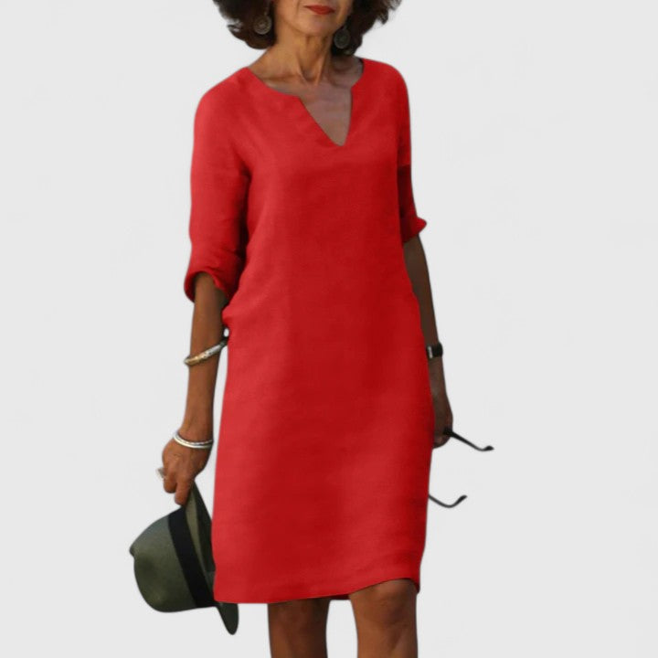 Easy care women's V-neck dress, perfect for comfortable, everyday elegant fashion.