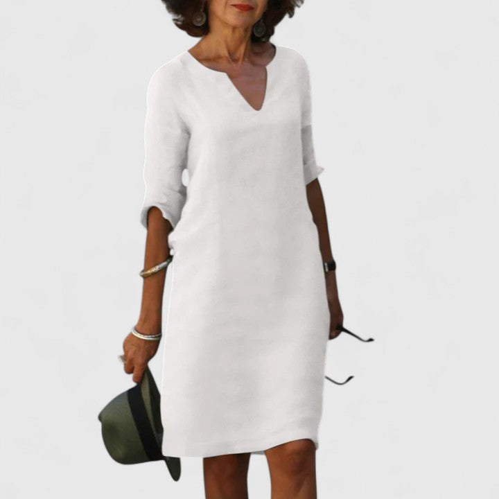 Stylish women's V-neck midi dress, ideal for casual wear, comfort, and versatile summer fashion.