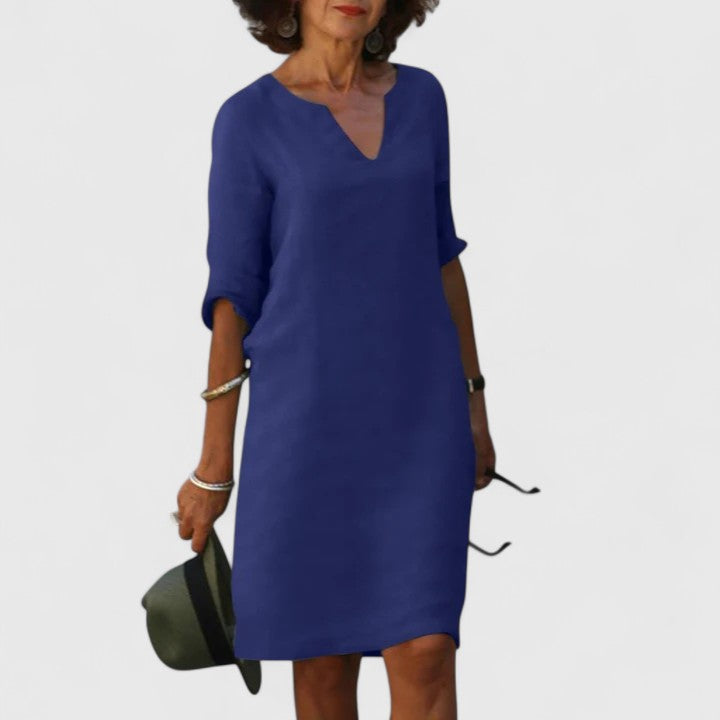 Comfortable women's V-neck dress, an easy care midi for effortless, elegant style.