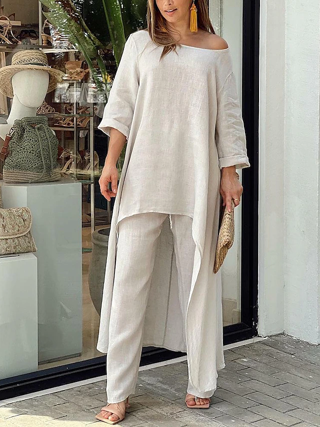 Effortless chic women's two-piece lounge set. Long sleeve top & wide leg pants for stylish, comfortable wear.
