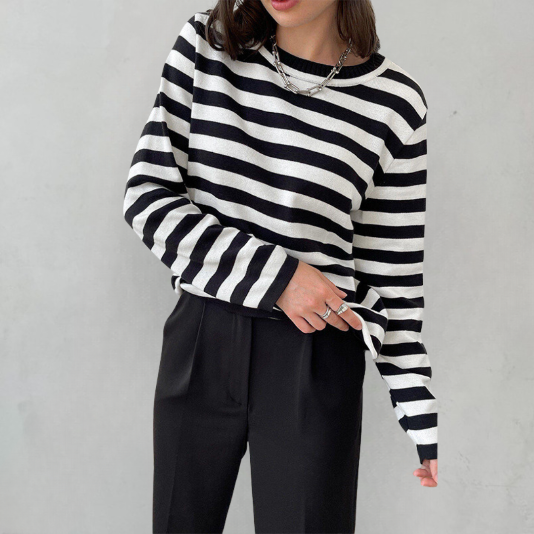 Elegant striped women's apparel, a comfortable round neck t-shirt, perfect for casual chic style.