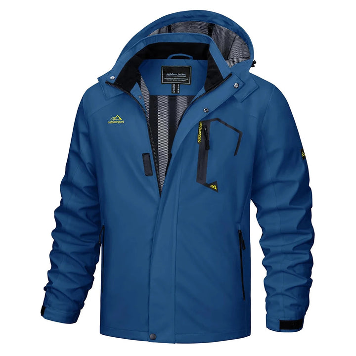 Man wearing blue lightweight hooded rain jacket on a trail, ideal for outdoor adventures & protection.