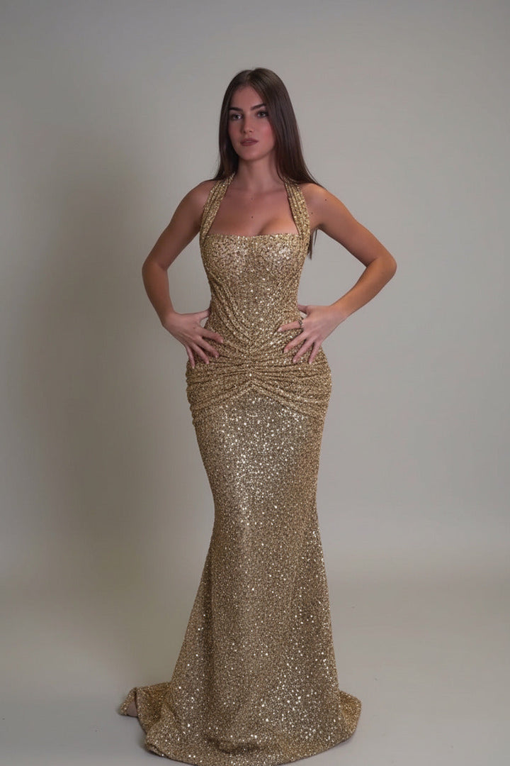 Elegant women's gold halter maxi dress, perfect for formal occasions & evening parties. Luxurious long summer gown.