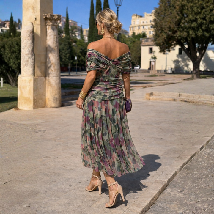 Women's off-shoulder maxi dress designed for effortless summer style, ideal for beach & casual events.