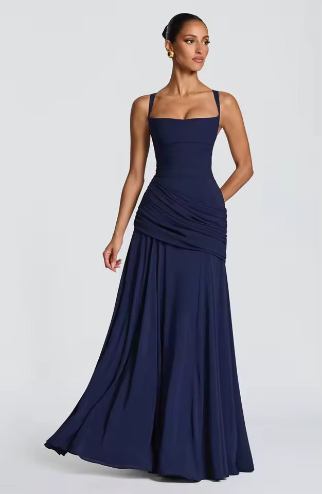 Flowy sleeveless maxi dress with a sweetheart neckline, ideal for casual comfort and stylish summer outings.