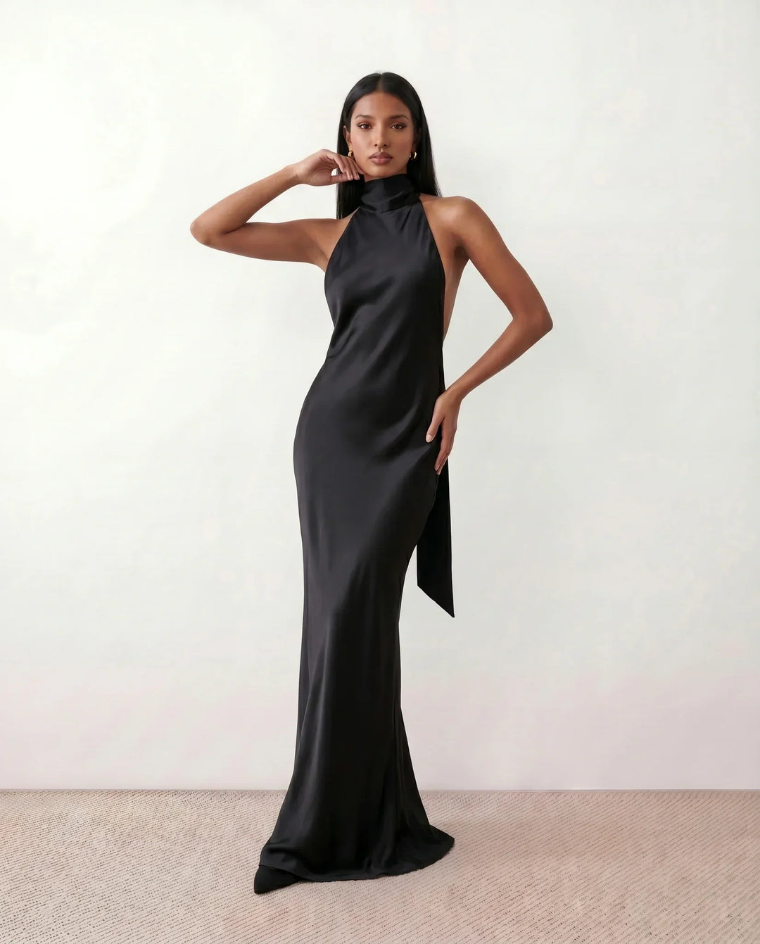 Chic flowing halter maxi dress for women, perfect for elegant evening events, parties or comfortable resort wear.