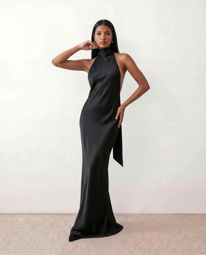 Chic flowing halter maxi dress for women, perfect for elegant evening events, parties or comfortable resort wear.