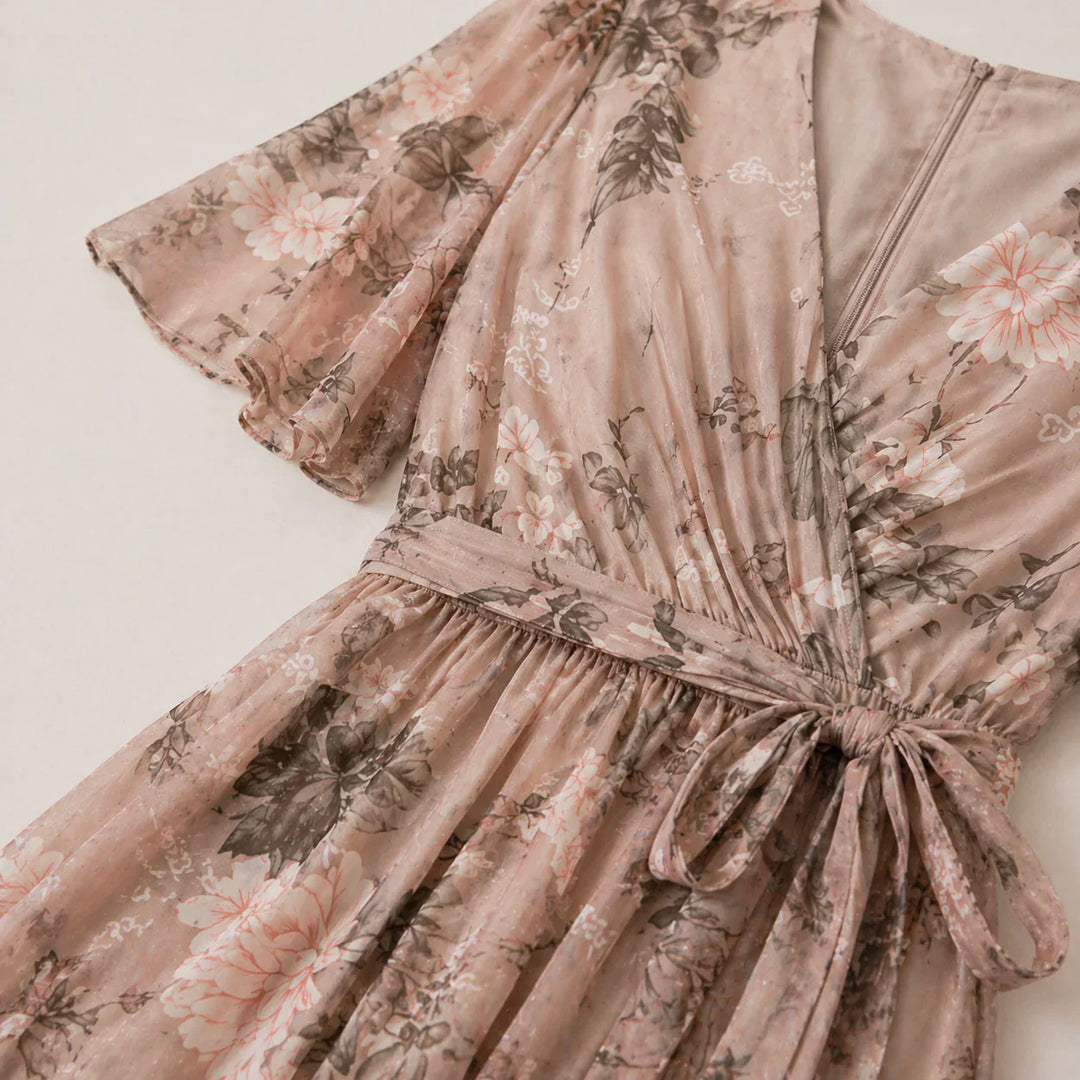 Chic women's floral midi dress, a flattering day-to-evening style with effective tummy control.