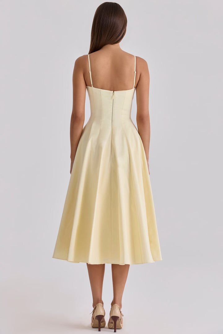 Summer women's dress: a stylish midi with a gathered bust design, offering chic and comfortable wear.